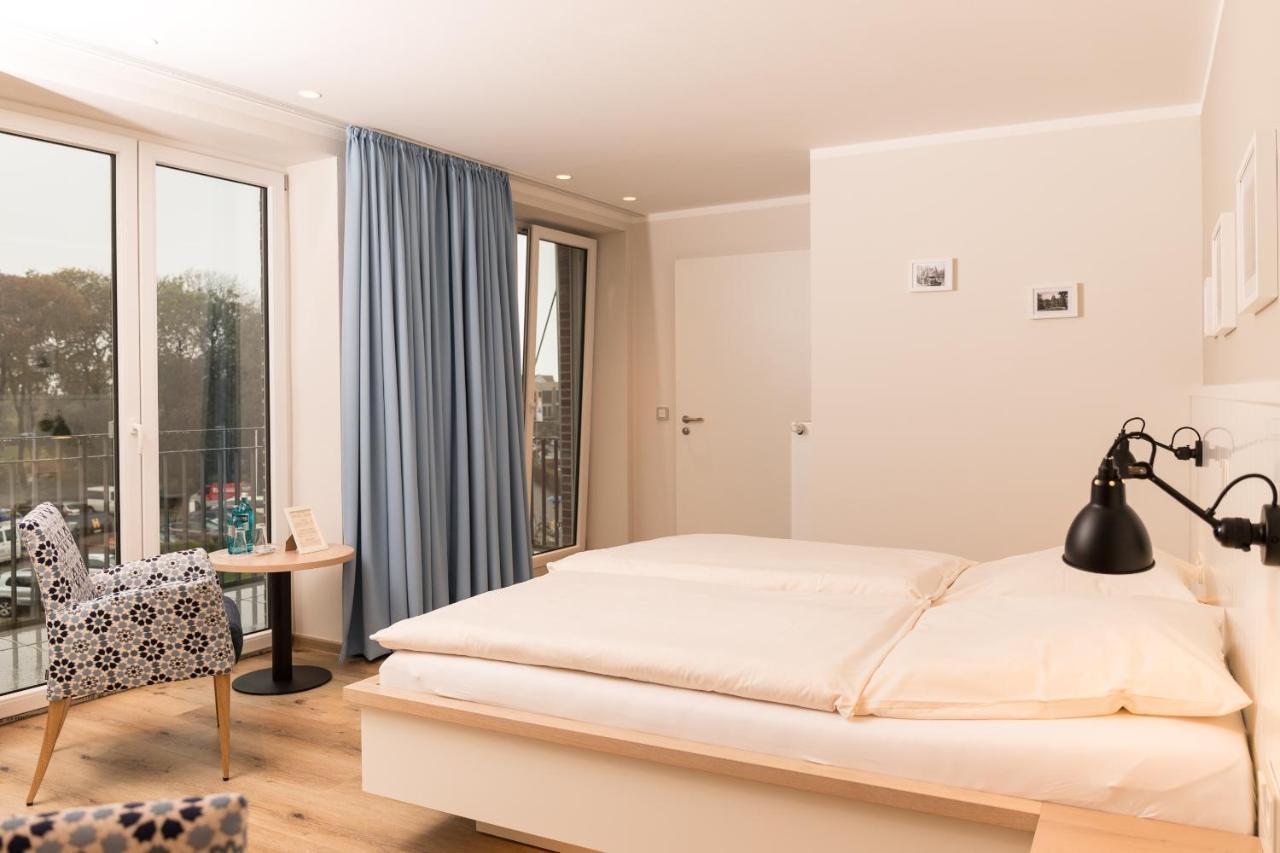 Mingers Hotel Neuharlingersiel Eksteriør bilde